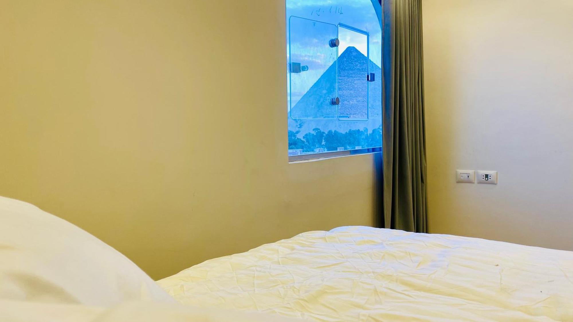 Oh Pyramids View Hotell Kafret el-Gabal Exteriör bild