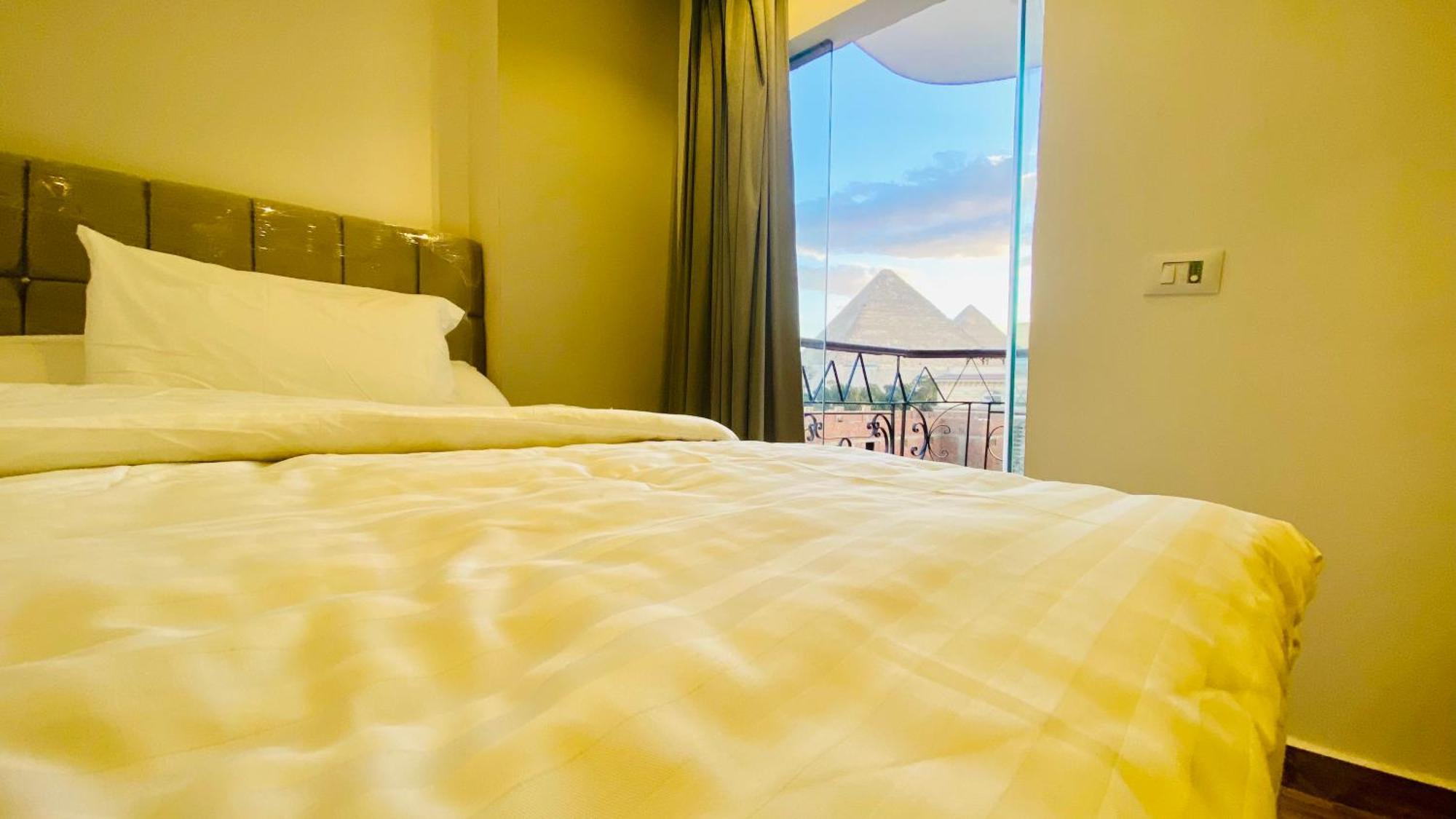 Oh Pyramids View Hotell Kafret el-Gabal Exteriör bild